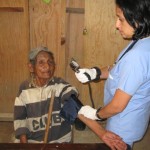 Ana checking an elderly patients