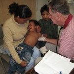 Dr Jerry with one of his many young patients