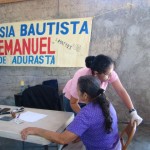 Dr. Ana checking a patient