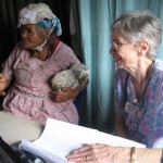 Dr. Pat with a lady that has no home, but lives in the Los Jobos community
