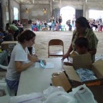 Jessica Murphy explaining to a patient how to take her medicine